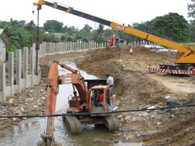 Installation of Concrete Sheetpile System in progress