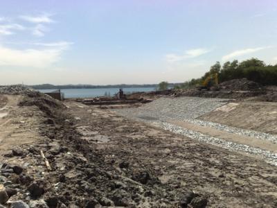 Laying Renomattres along the outlet channel